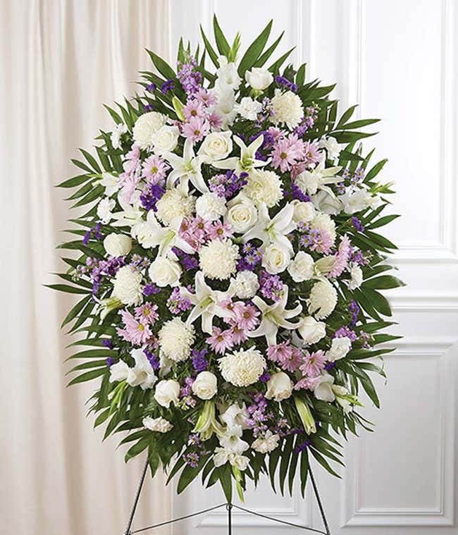 Lavender &amp; white standing sympathy spray with roses
