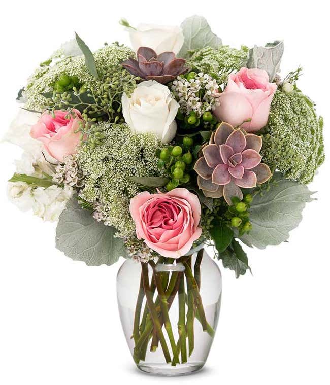 Pink rose and succulent arrangement